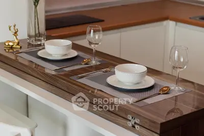 Elegant kitchen with stylish dining setup and modern decor