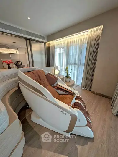 Luxurious living room with modern massage chair and elegant decor