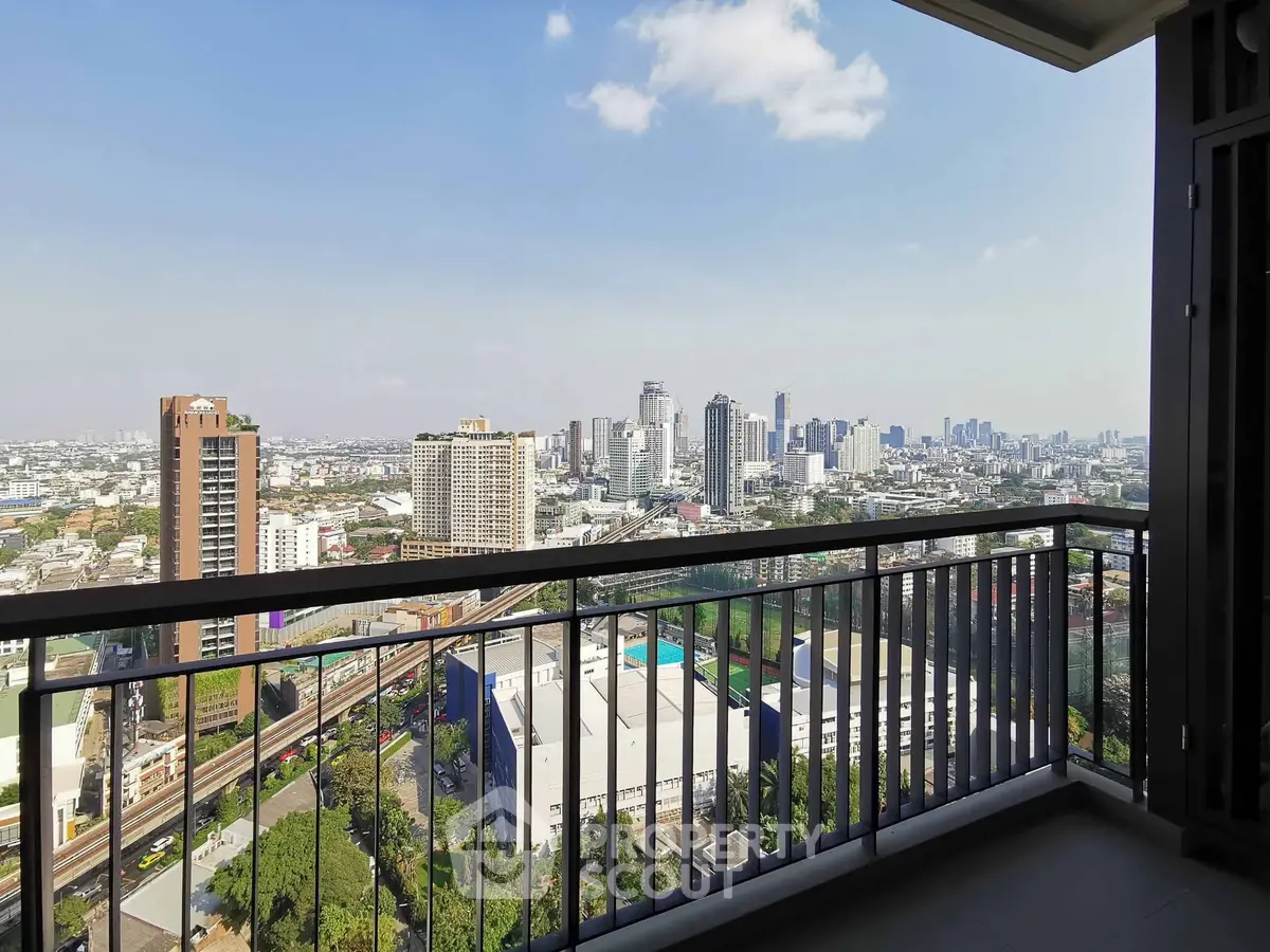 Stunning cityscape view from a high-rise balcony, perfect for urban living enthusiasts.