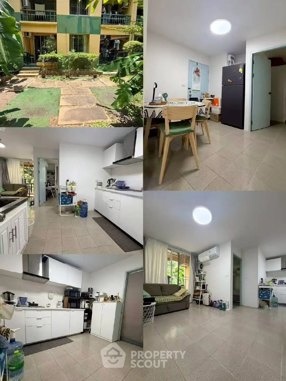Charming apartment with modern kitchen, cozy living room, and lush garden view.
