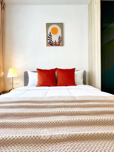 Modern bedroom with stylish decor and cozy ambiance