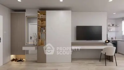 Modern living room with sleek design, wall-mounted TV, and stylish furniture in a contemporary apartment.
