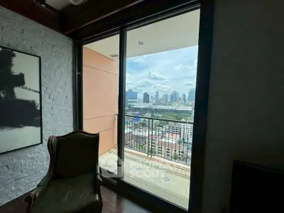 Stunning city view from a modern apartment balcony with elegant interior design.