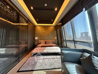 Luxurious modern bedroom with floor-to-ceiling windows and elegant decor