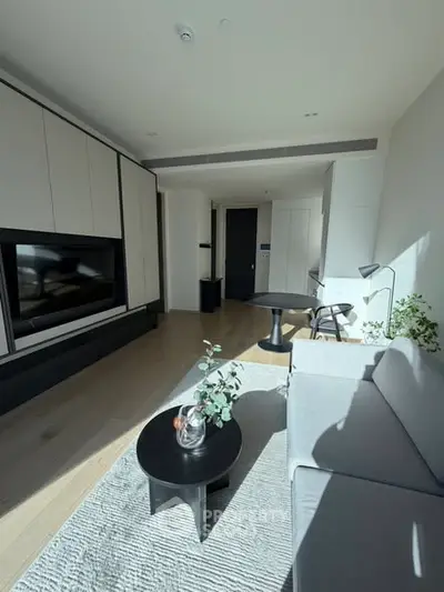 Modern living room with sleek furniture and natural light