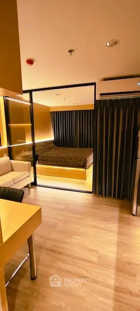 Modern studio apartment with cozy bedroom and stylish decor