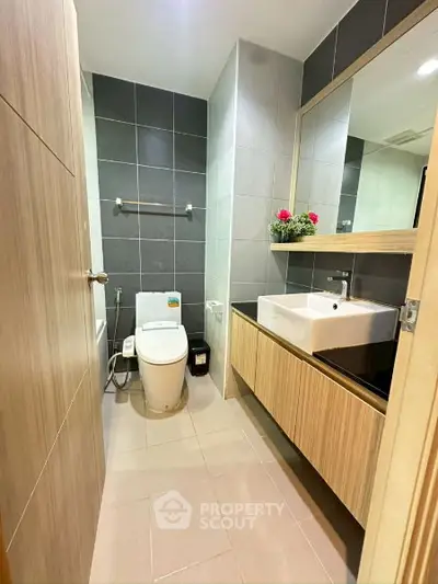 Modern bathroom with sleek fixtures and stylish tile design