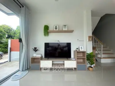 Modern living room with sleek TV setup and stylish decor