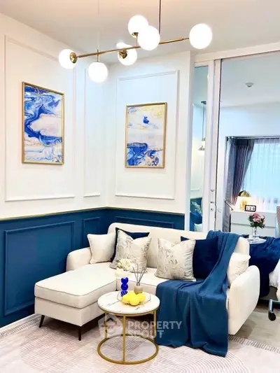 Stylish living room with modern decor and cozy seating area in a contemporary apartment.