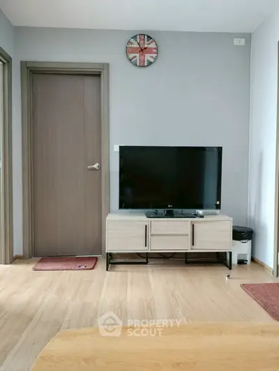 Modern living room with sleek TV setup and stylish decor