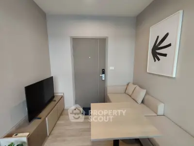 Modern living room with minimalist decor and cozy seating area