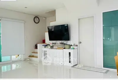 Modern living room with sleek TV setup and stylish decor