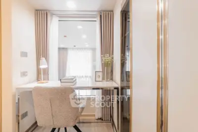 Elegant study nook with modern desk and cozy chair, perfect for productivity.