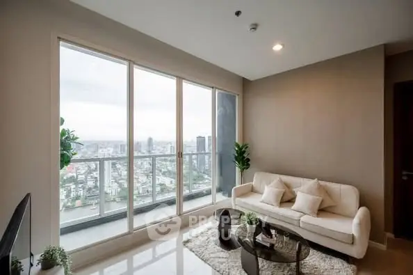 Modern living room with stunning city view and elegant decor