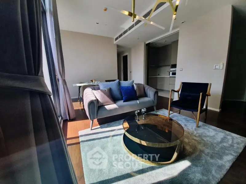 Modern living room with stylish furniture and natural light