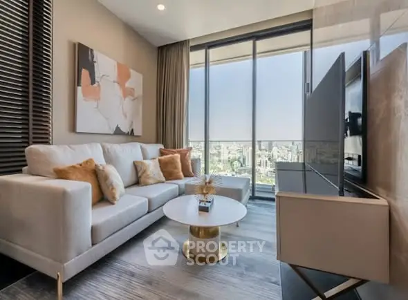 Modern living room with city view, stylish decor, and comfortable seating.