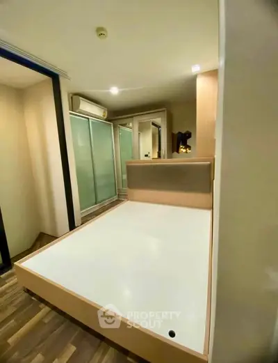Modern bedroom with sleek design and built-in storage solutions