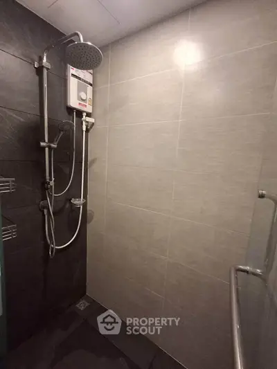 Modern bathroom with sleek shower design and contemporary tiles