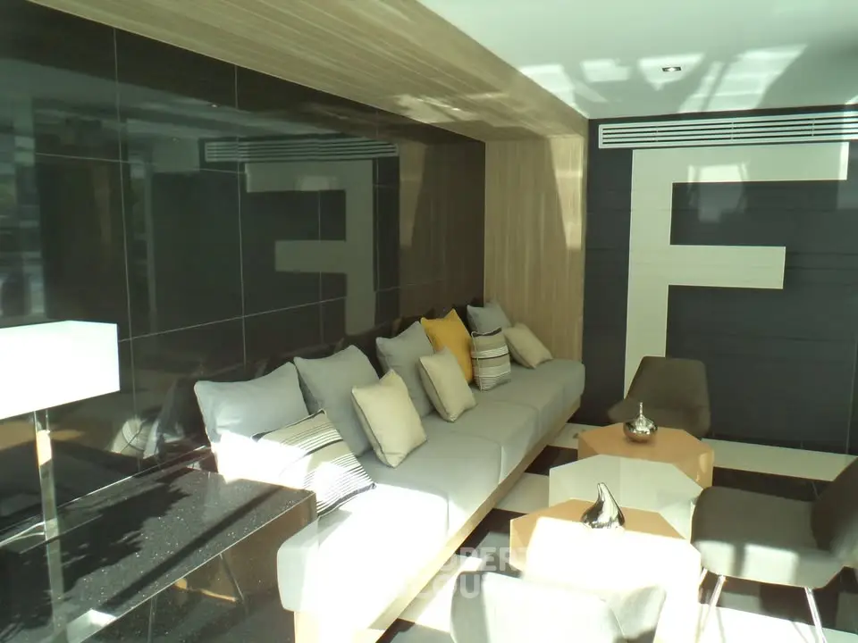 Modern living room with stylish decor and ample natural light