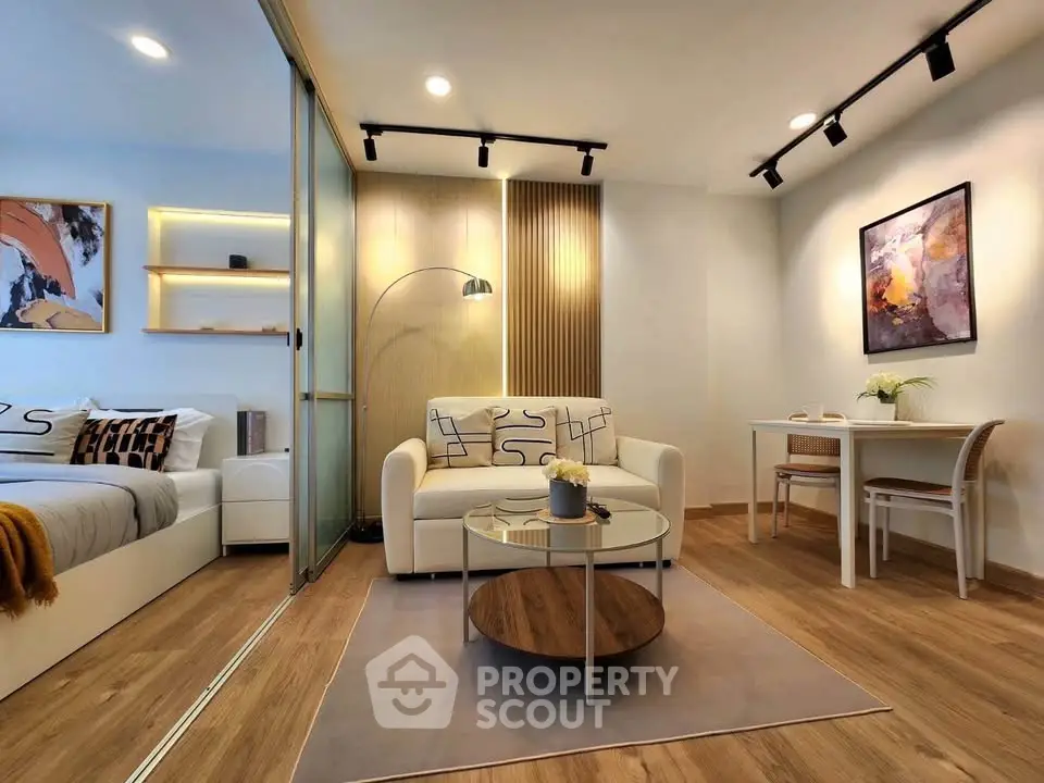 Modern living room with cozy decor and stylish furniture in a contemporary apartment.