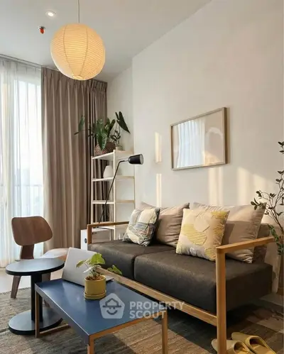 Chic modern living room with stylish furniture and natural light