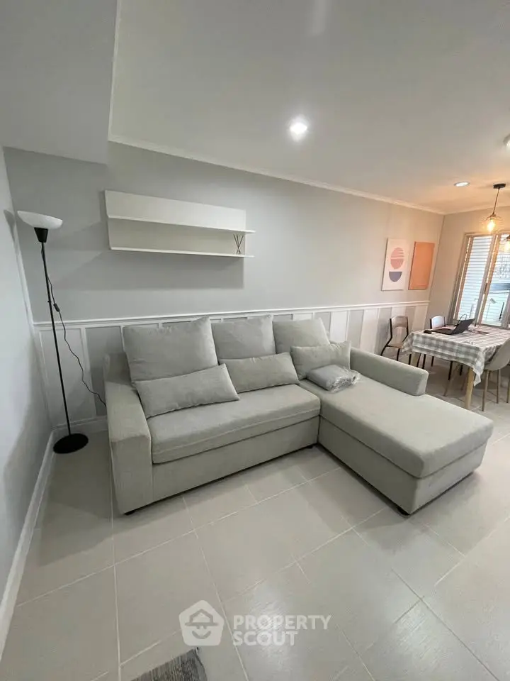 Modern living room with cozy sectional sofa and stylish decor