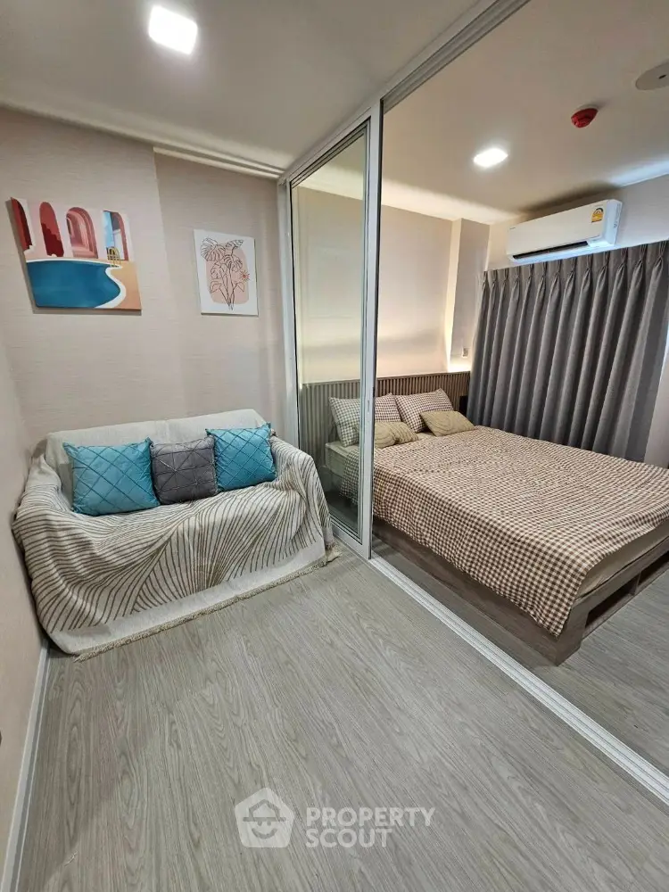 Cozy bedroom with stylish decor and comfortable bedding in modern apartment