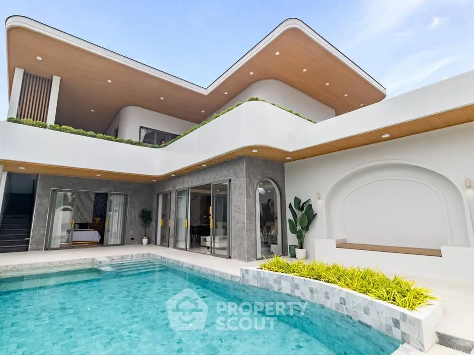 Luxurious modern villa with stunning pool and sleek architectural design, perfect for upscale living.