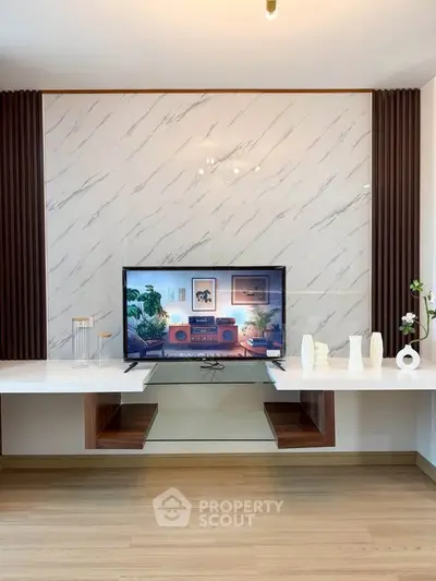 Modern living room with stylish TV setup and elegant decor