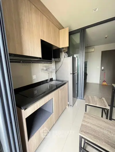 Modern kitchen with sleek cabinets and stainless steel appliances