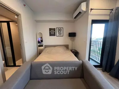 Modern bedroom with balcony view and stylish decor