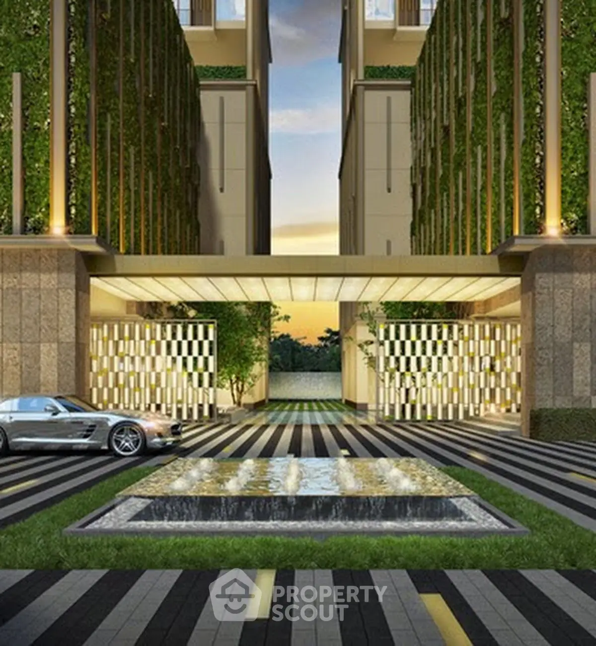 Luxurious modern building entrance with sleek design and elegant water feature.