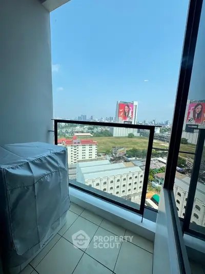 Stunning high-rise balcony with panoramic city views, perfect for urban living.