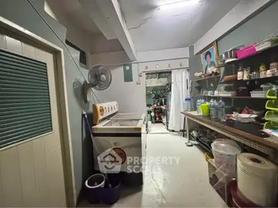 Cozy kitchen with open shelving and modern appliances