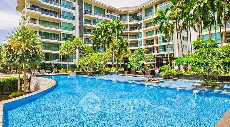 Luxurious condominium with stunning pool and lush tropical landscaping