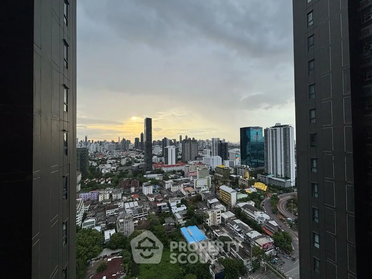Stunning cityscape view from high-rise building at sunset