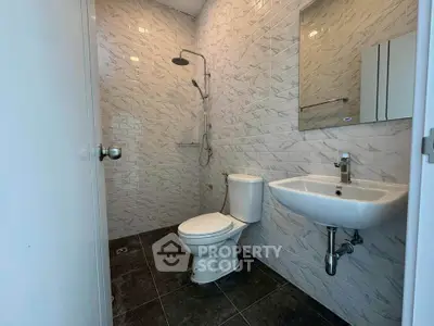 Modern bathroom with sleek fixtures and stylish tile design