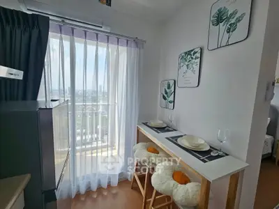 Charming dining nook with city view, featuring cozy seating and elegant decor, perfect for intimate meals.