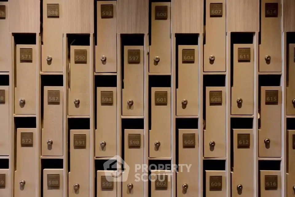 Elegant wooden mailboxes in a modern apartment building lobby