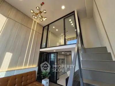 Modern loft apartment with stylish staircase and elegant lighting