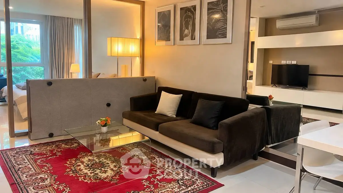 Stylish modern living room with elegant decor and large window view