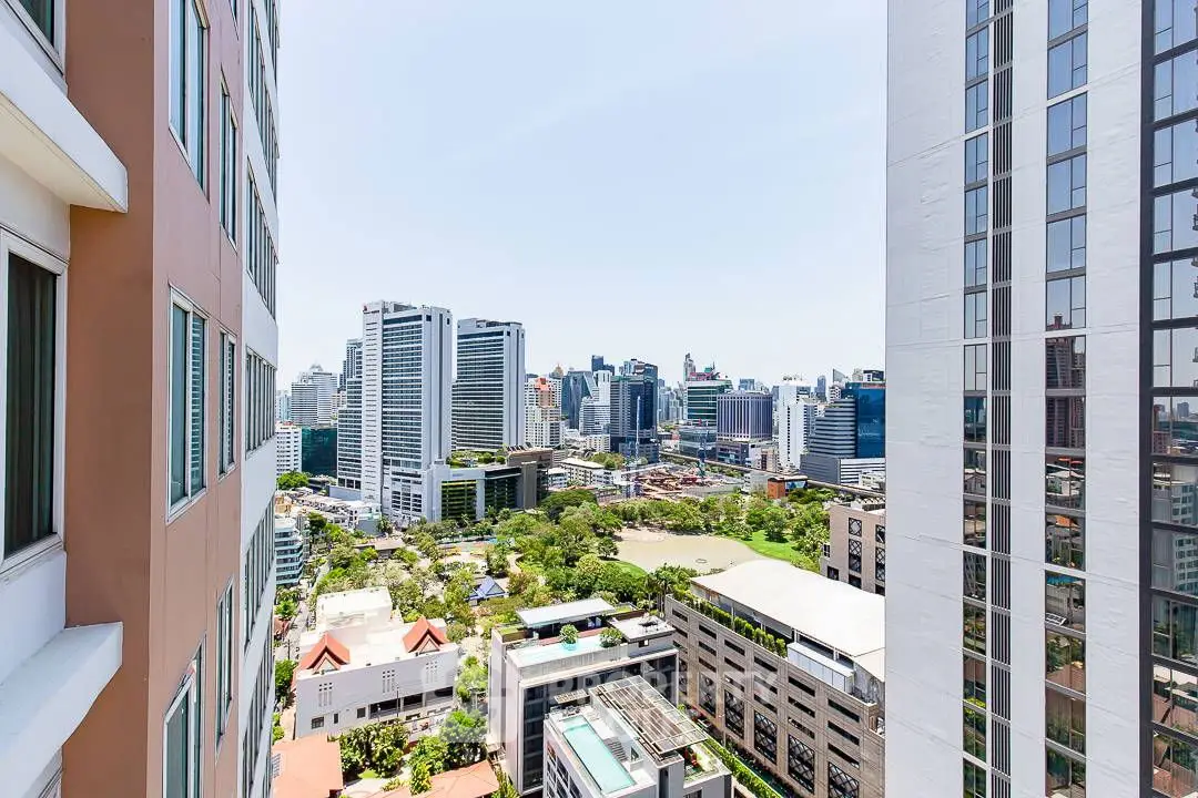 Modern urban building with unique architectural design and cityscape view.