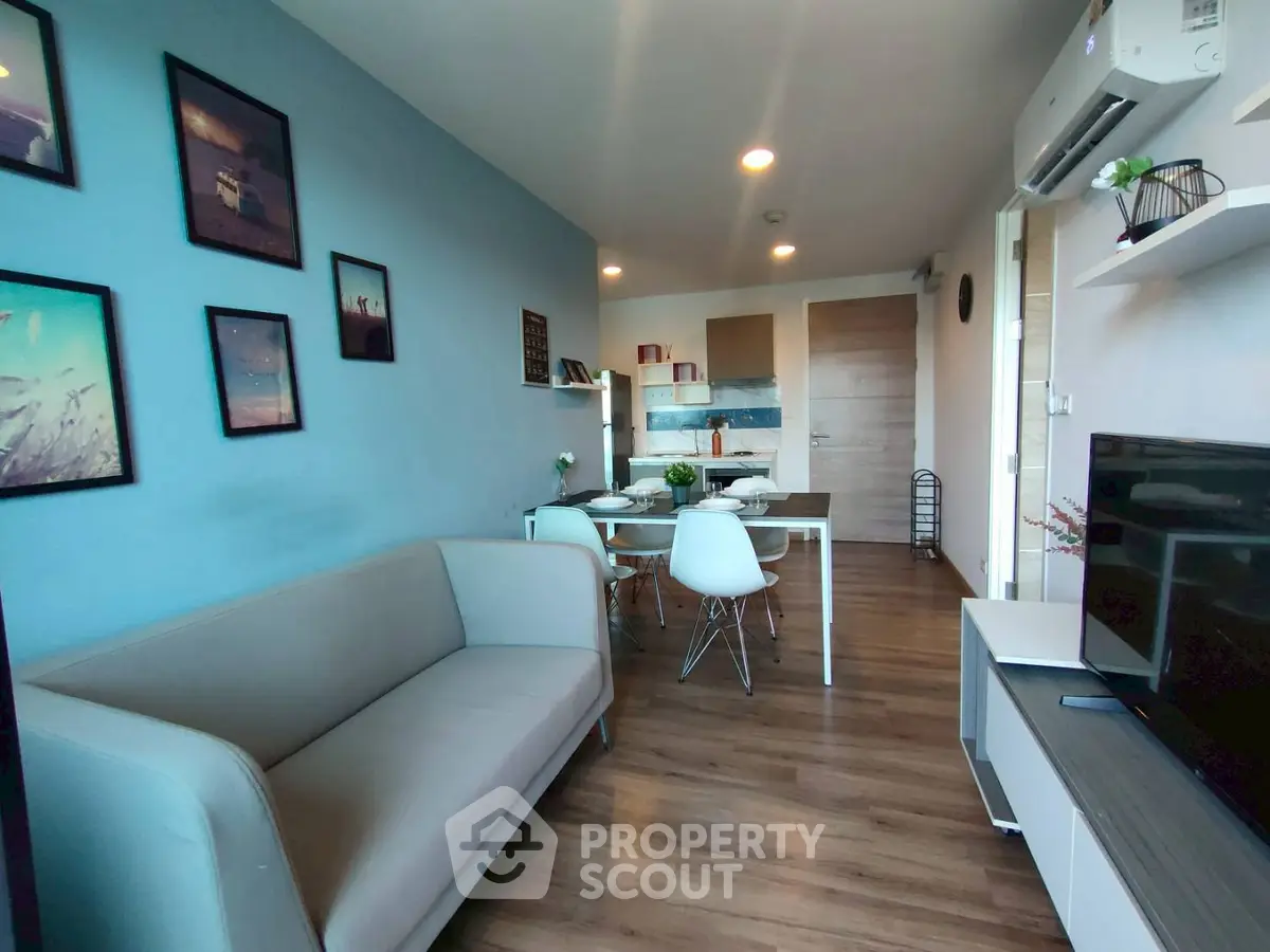 Modern living room with stylish decor and open kitchen layout