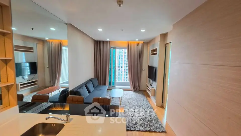 Modern living room with sleek design and city view from balcony