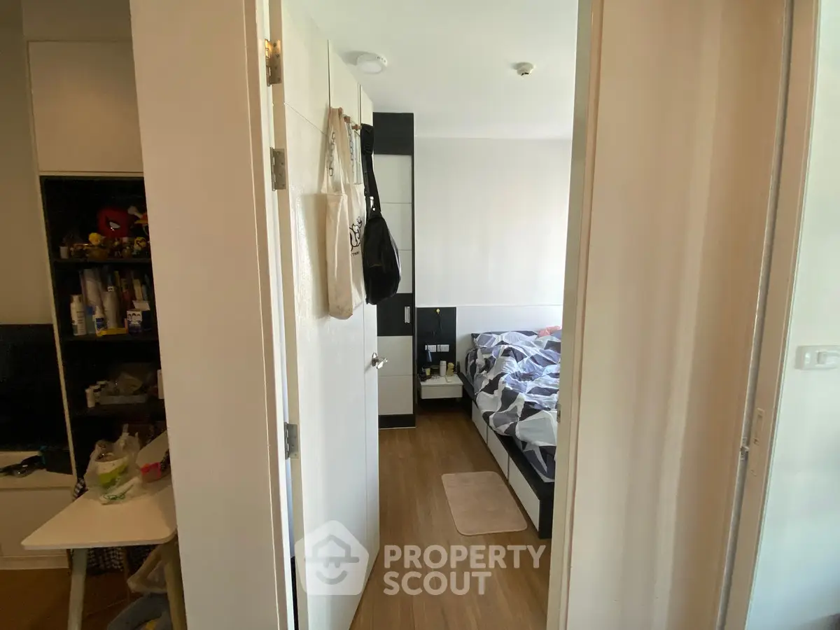 Cozy bedroom with modern decor and wooden flooring