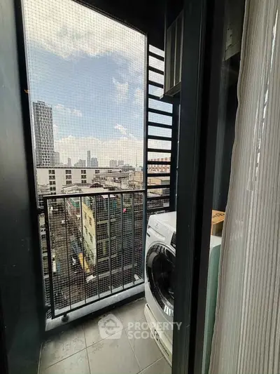 Urban balcony with city view and washing machine, perfect for modern living.