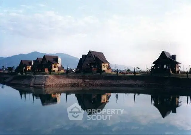 Charming lakeside cabins with mountain views, perfect for serene living or vacation retreats.