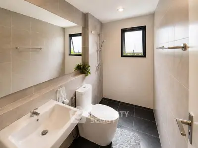 Modern bathroom with sleek fixtures and natural light