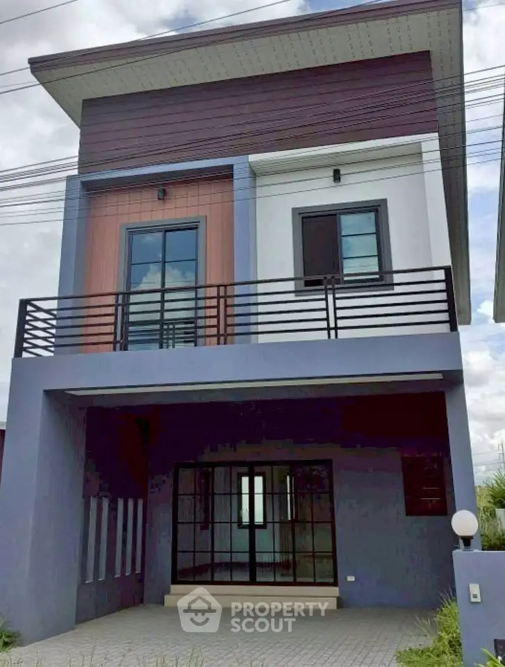 Modern two-story house with sleek design and spacious balcony