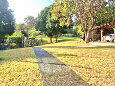 Charming countryside property with lush greenery and serene surroundings, perfect for nature lovers seeking tranquility.